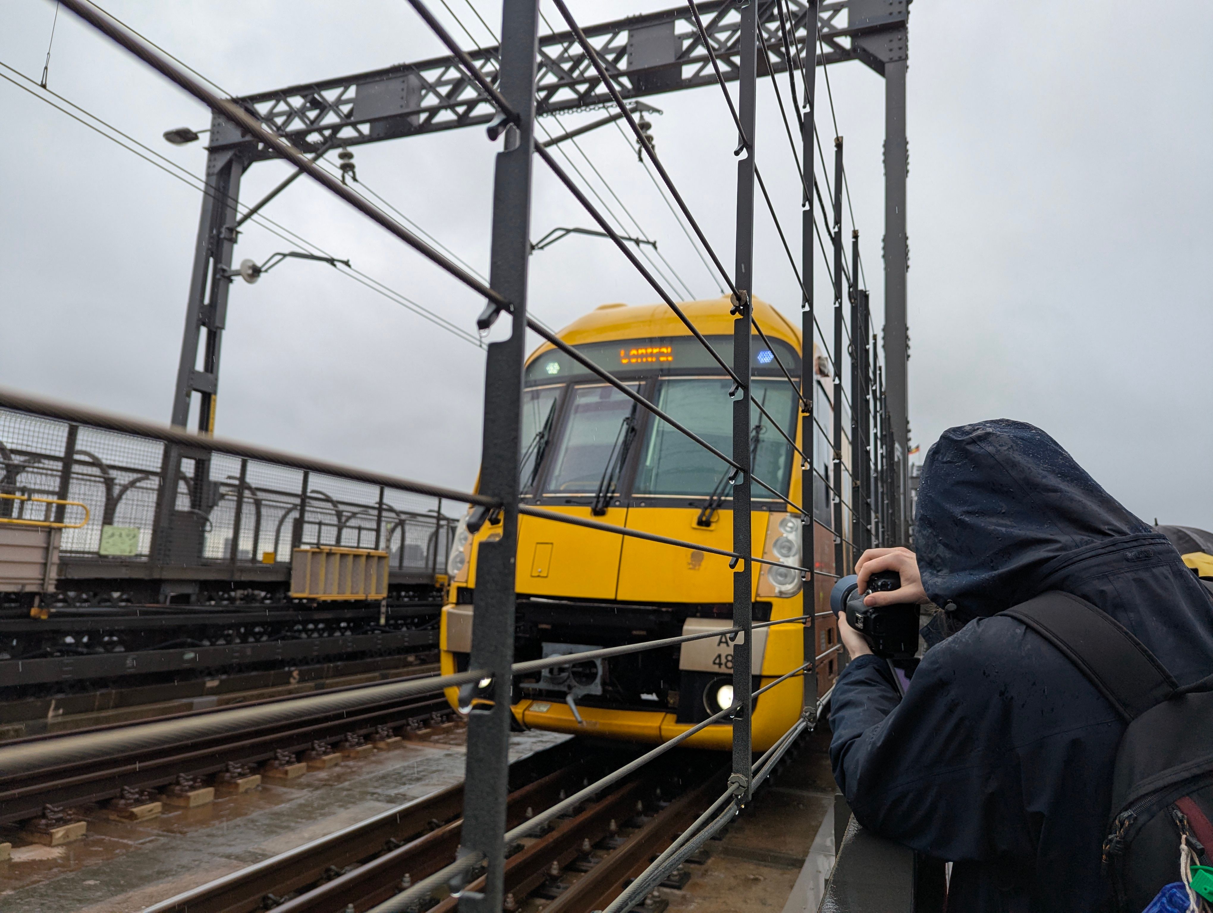 A Waratah Series 1 train on the Harbour Bridge heading towards Central taken from a low angle on the car lanes